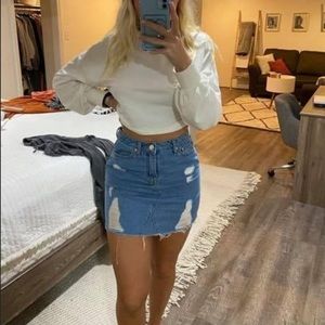 size 2, ripped light wash jean skirt